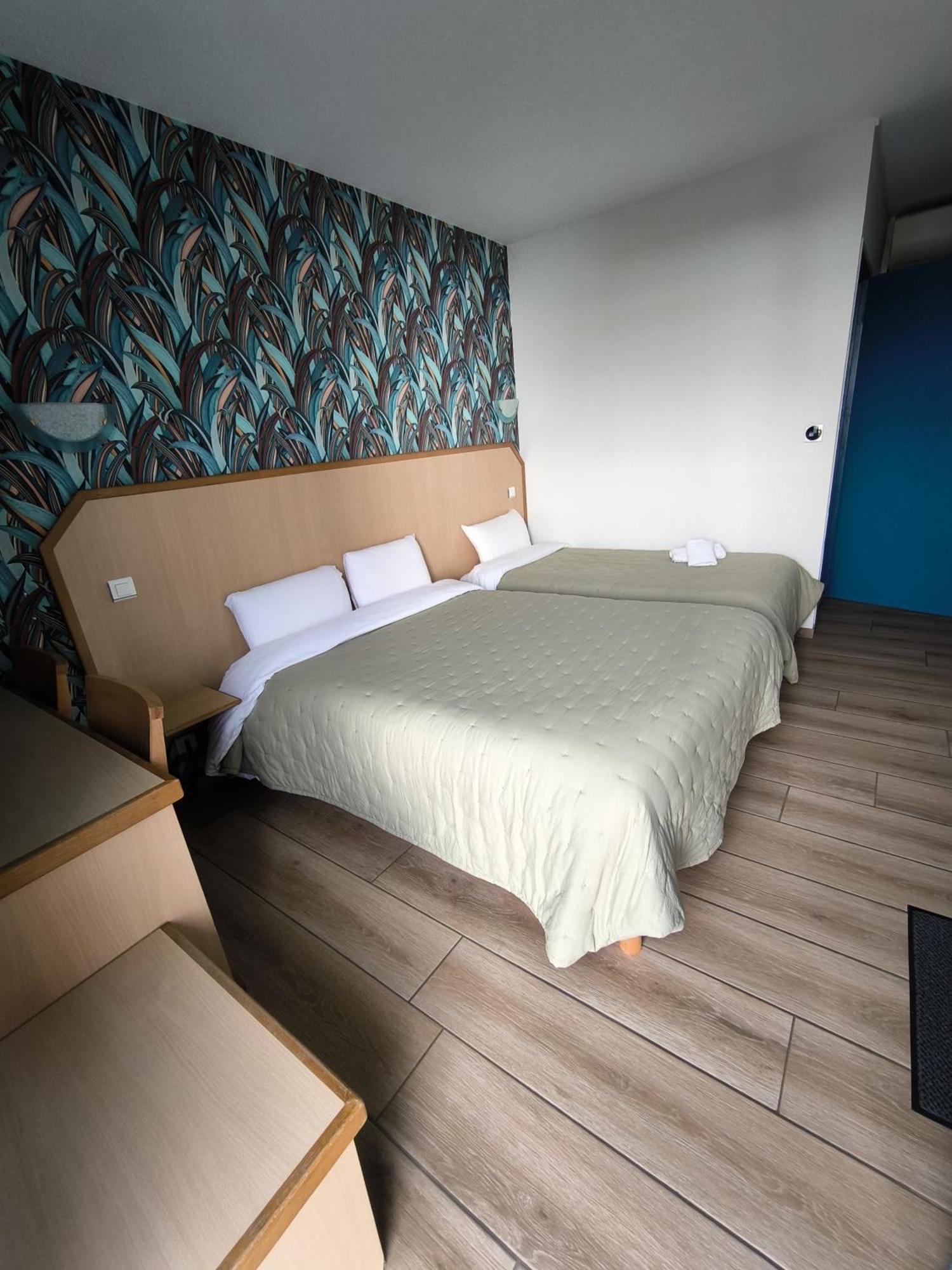 Hotel Le Laury'S Onet-le-Chateau Bagian luar foto