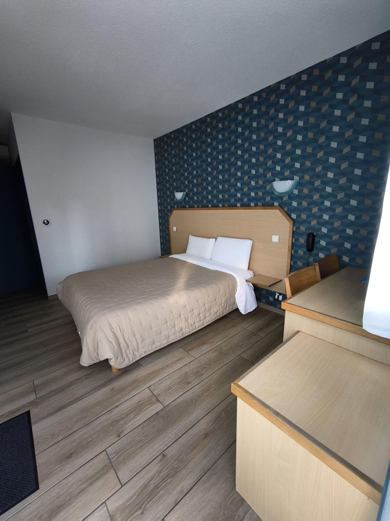 Hotel Le Laury'S Onet-le-Chateau Bagian luar foto