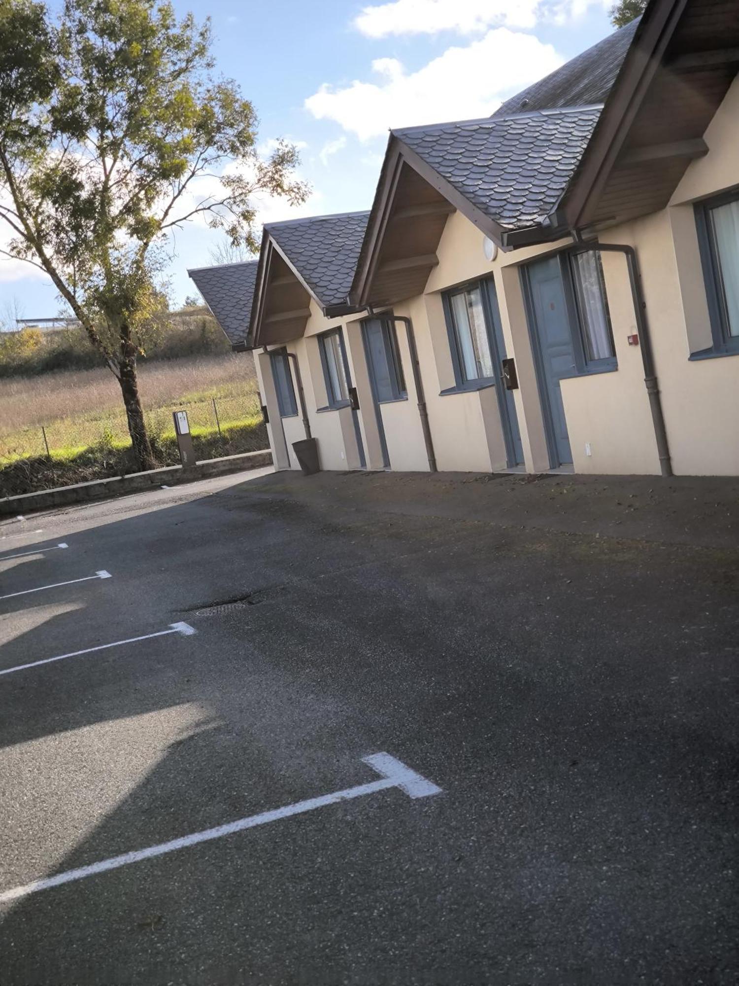 Hotel Le Laury'S Onet-le-Chateau Bagian luar foto