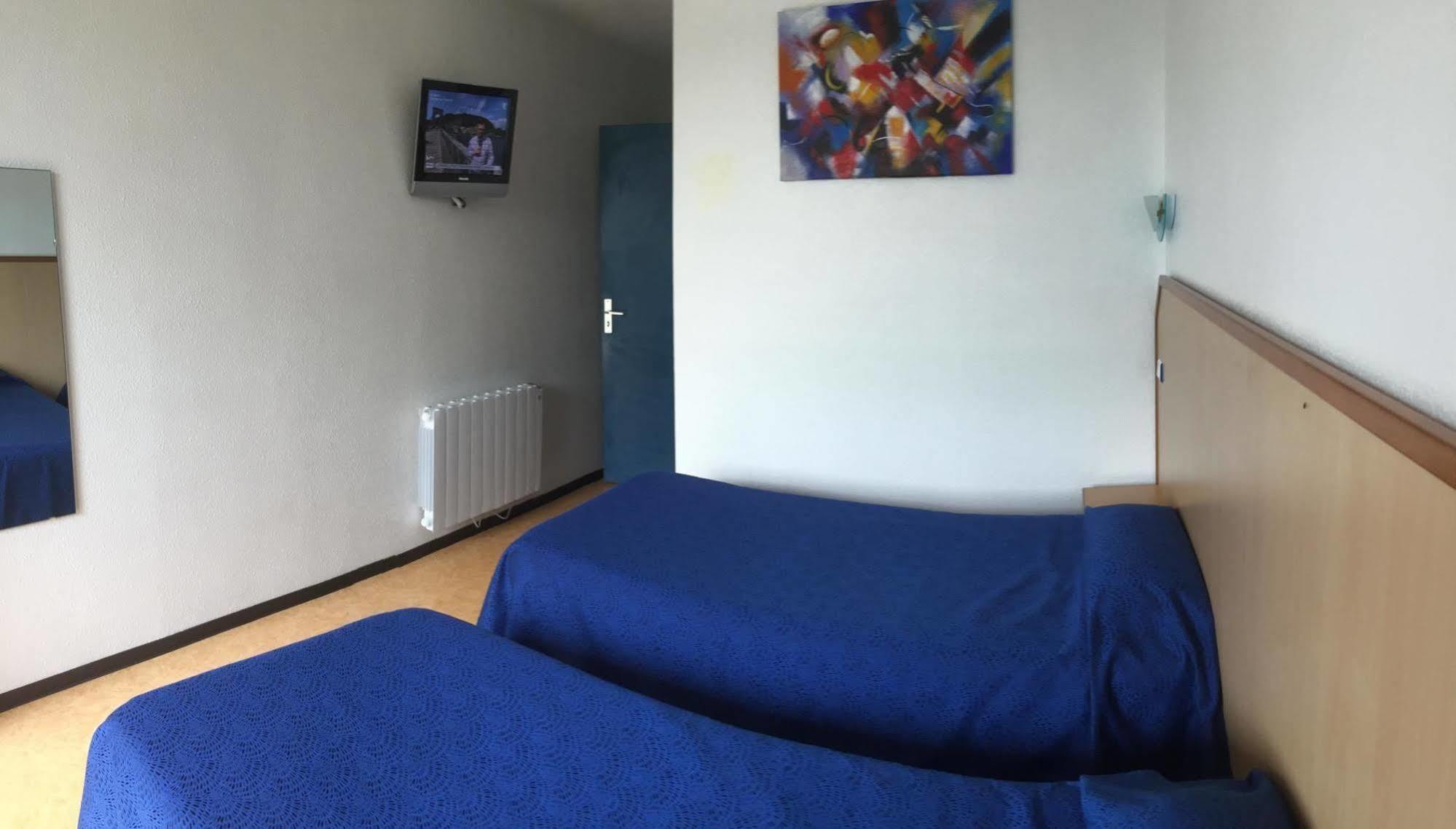 Hotel Le Laury'S Onet-le-Chateau Bagian luar foto